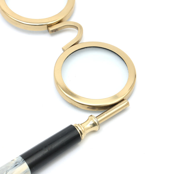 Loupe binoculaire de style antique avec finition dorée