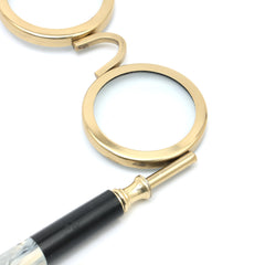 Loupe binoculaire de style antique avec finition dorée