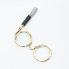 Loupe binoculaire de style antique avec finition dorée