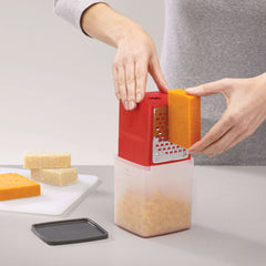 Grater with collection tray