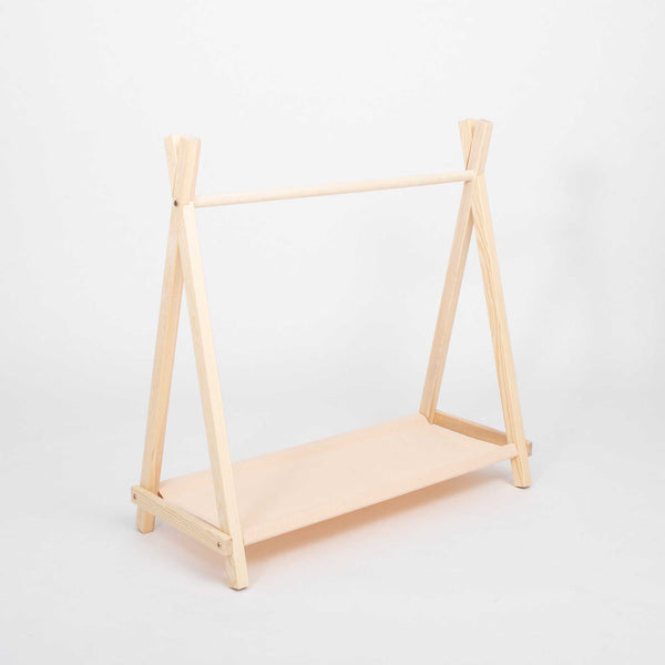 Children's clothing rack with storage space